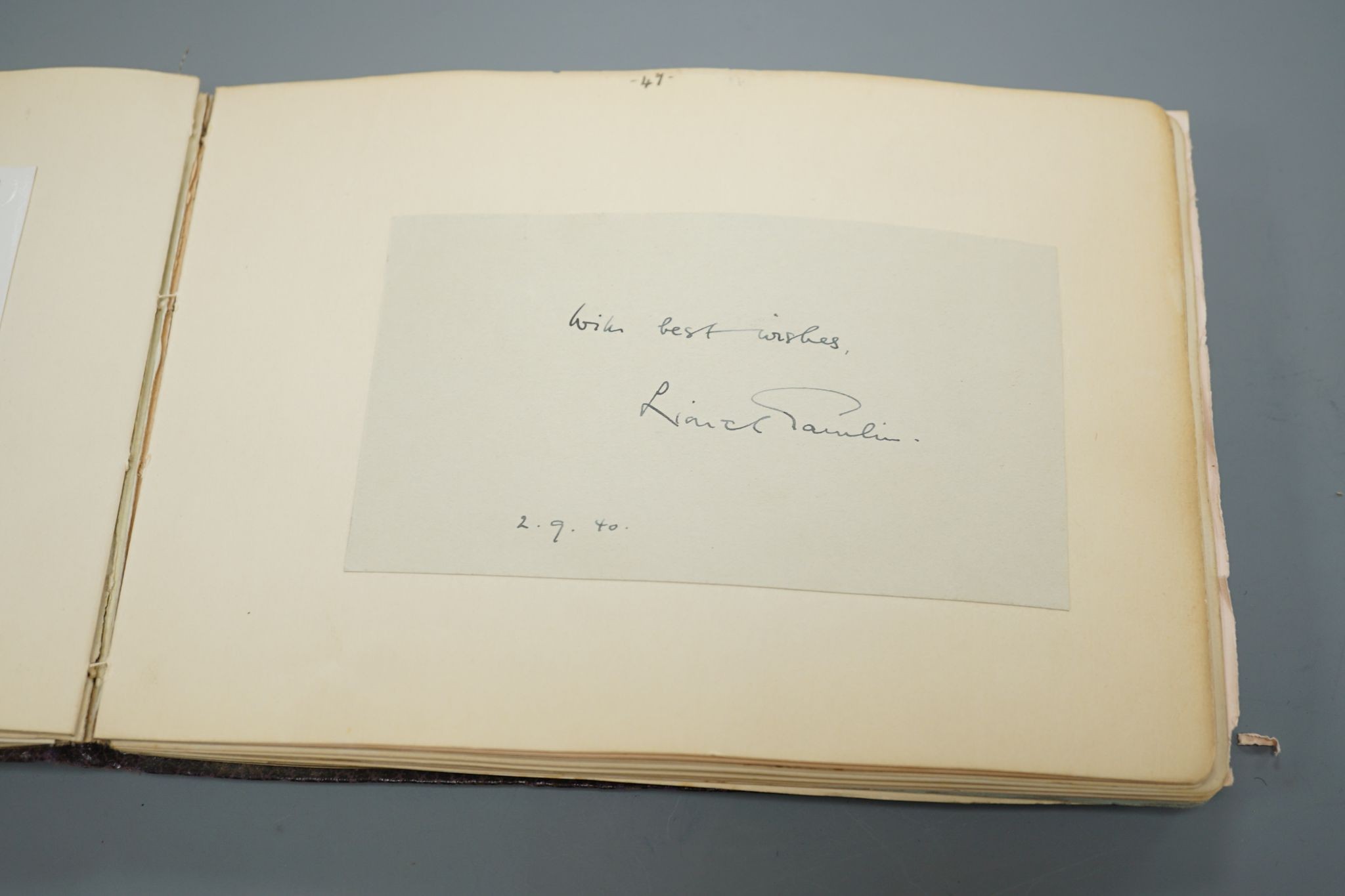 A 1930-40's autograph album including Judy Garland, Spencer Tracy, Basil Rathbone etc. and a photo album